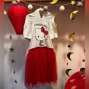 Super cute Hello Kitty dress size L. Cute ear hood detail and tutu skirt.